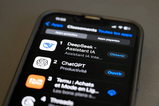 DeepSeek AI ranks first above ChatGPT in the App Store AI assistant category on a smartphone screen.