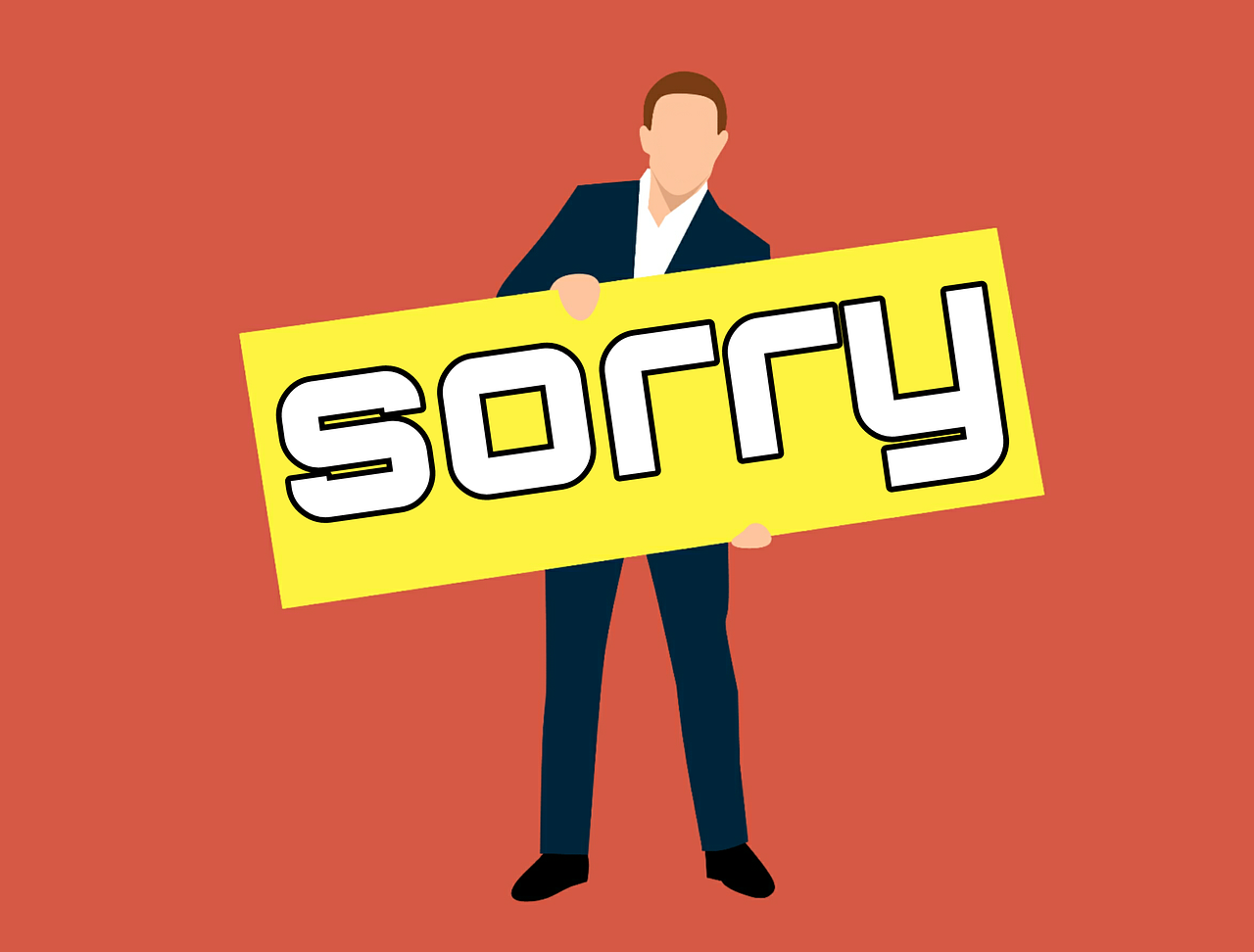A businessperson holding a sign that reads "Sorry," conveying a professional apology