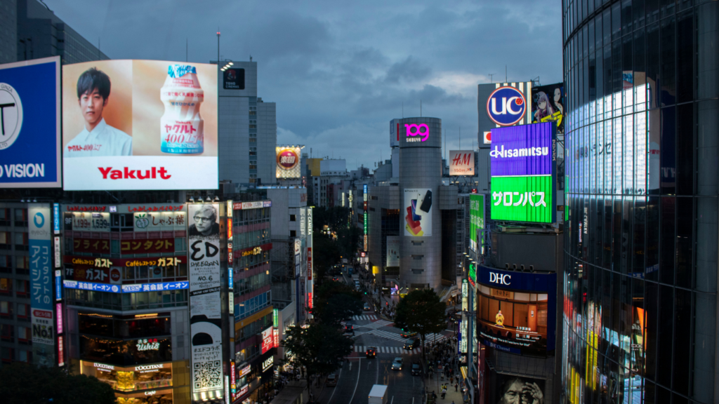 Traditional advertising methods like banners, newspapers, and hoardings in an urban setting