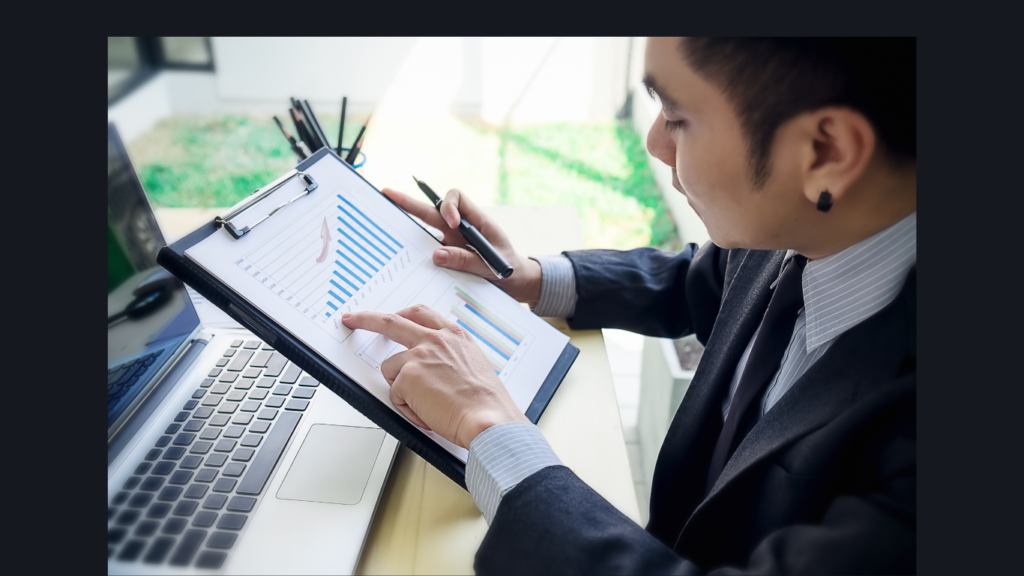 Small business owner tracking digital marketing results: Digital marketing for small businesses